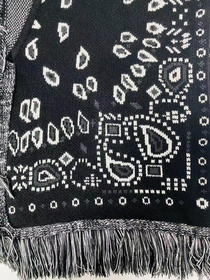 Manteau pull à pompon brodé à grand motif