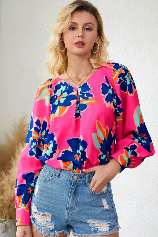 Blusa con manga farol y cuello en V con estampado floral