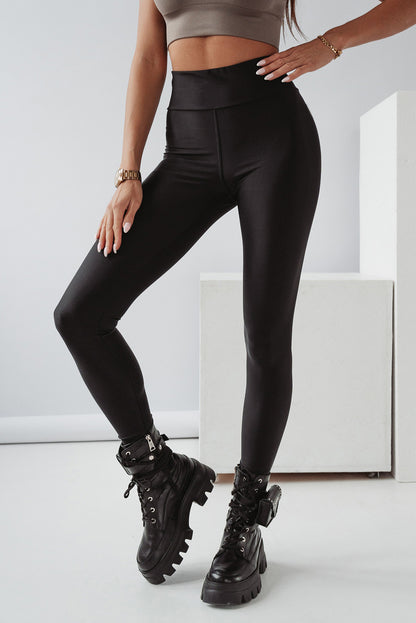 Leggings negros de cintura alta con control de barriga cruzados