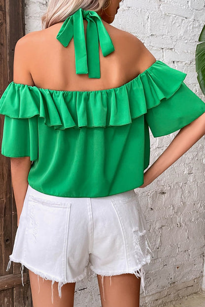 Blusa a capas con volantes y cuello halter