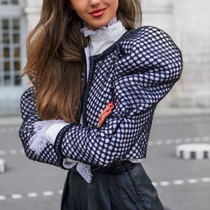 Chaqueta ajustada con cuello y mangas abullonadas