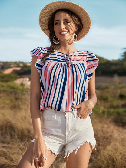 Blusa a rayas con mangas abullonadas y anudada