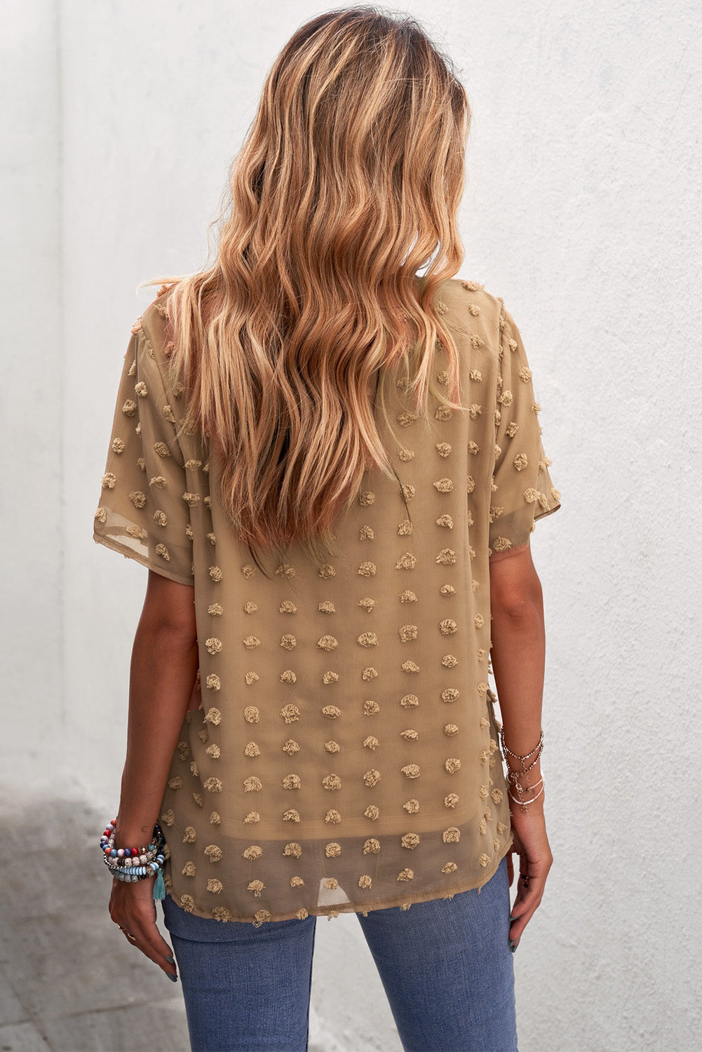 Blusa con cuello redondo y lunares suizos