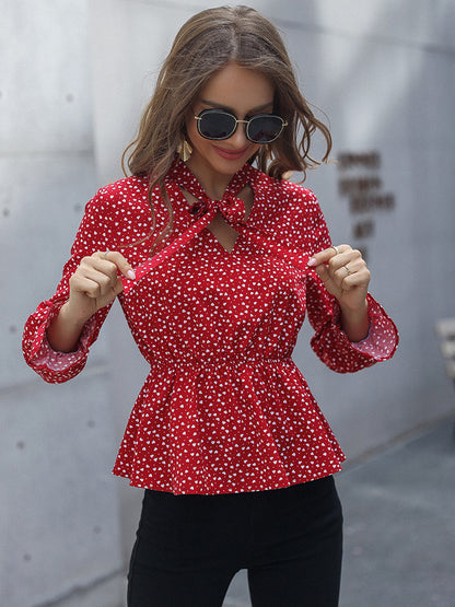 Blusa peplum con mangas con volantes estampada