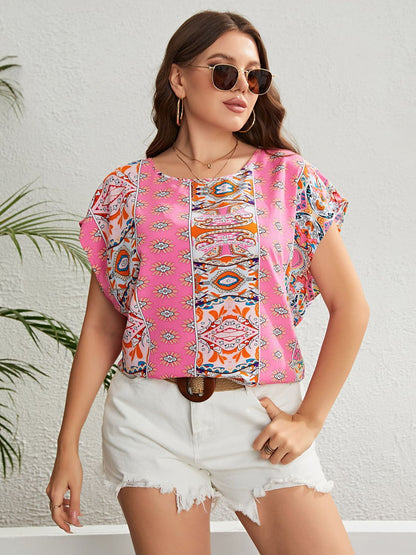 Blusa estampada con cuello redondo y talla grande