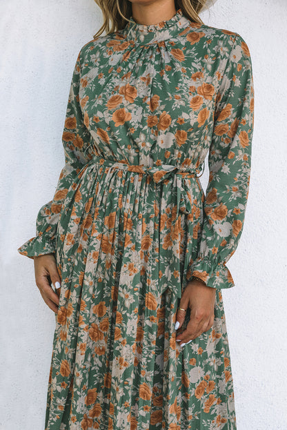 Robe longue à fleurs plissée verte à manches longues avec cravate