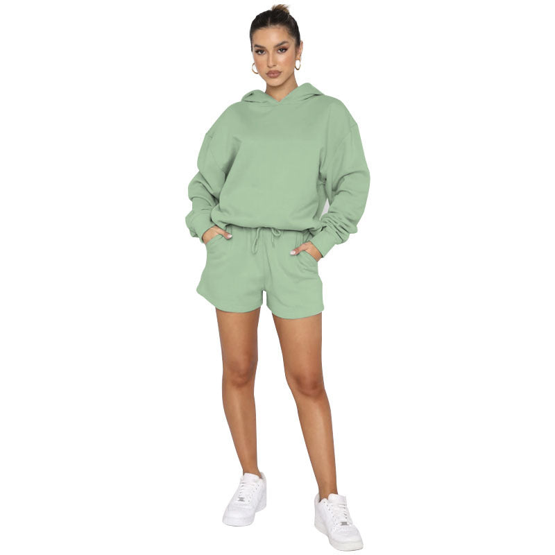 Pull de couleur unie à capuche et manches longues pour femme