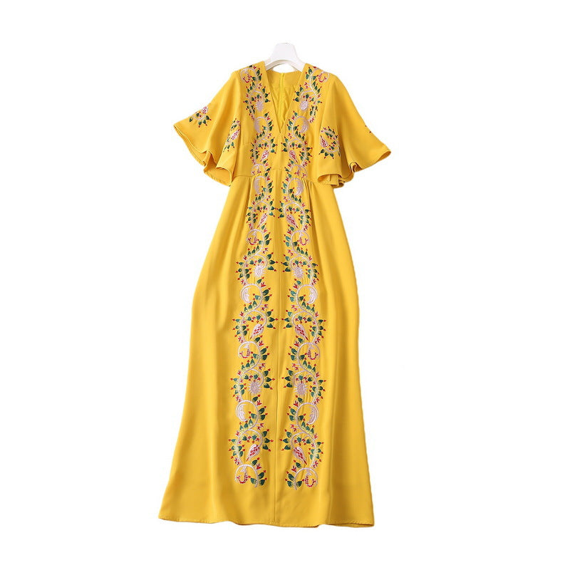 Vestido amarillo con manga de hoja de loto bordado a máquina