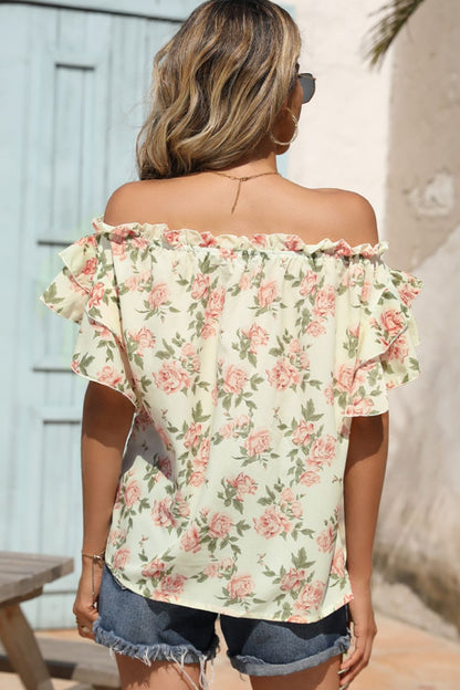 Blusa con hombros descubiertos y ribete de volantes florales