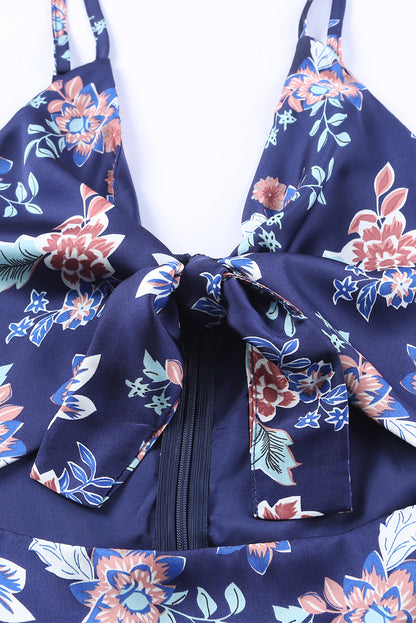 Robe longue bleue à imprimé floral avec nœud sur le buste et fente