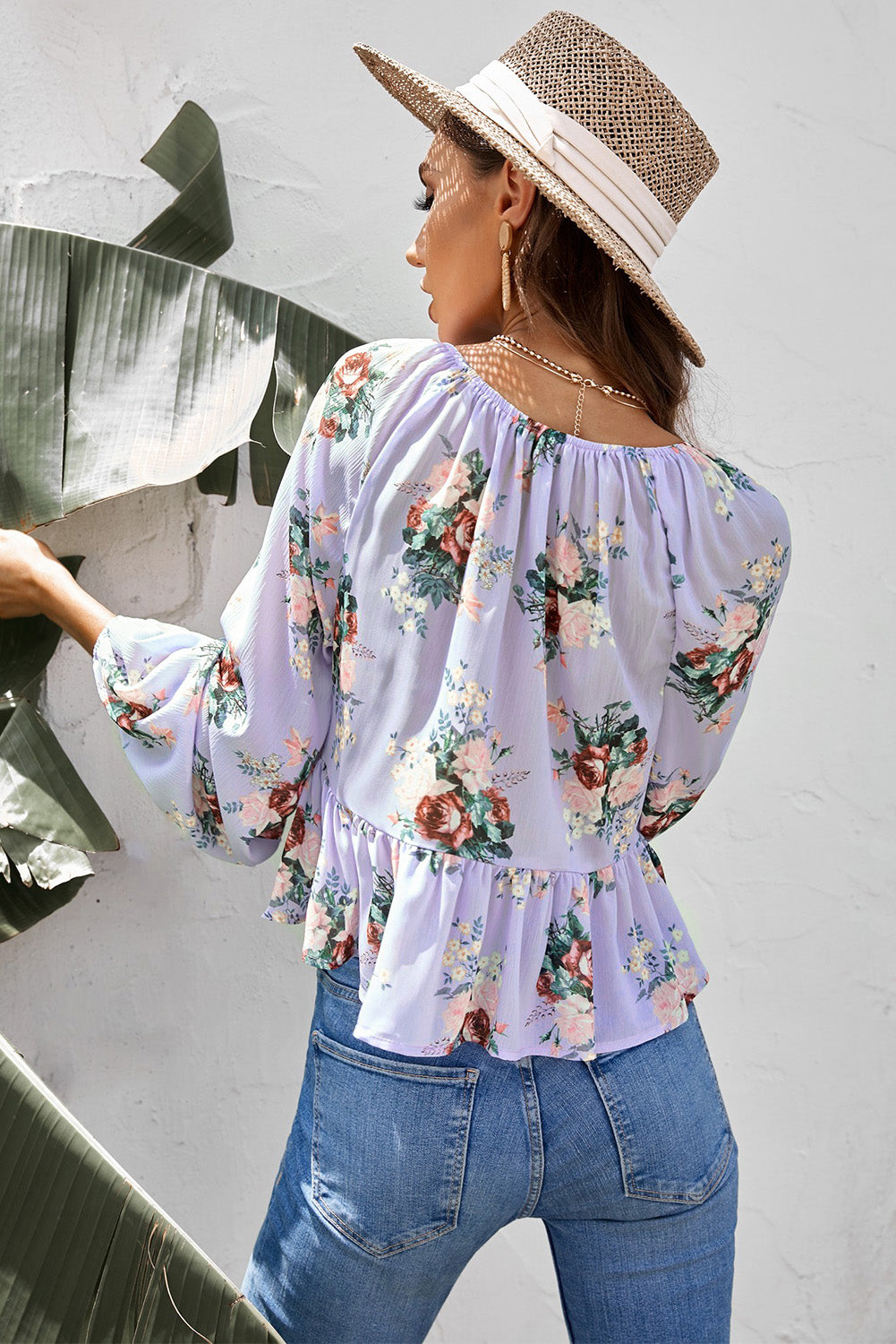 Blusa peplum retorcida floral