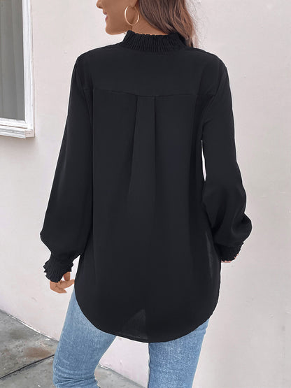 Blouse smockée à manches longues et crantée