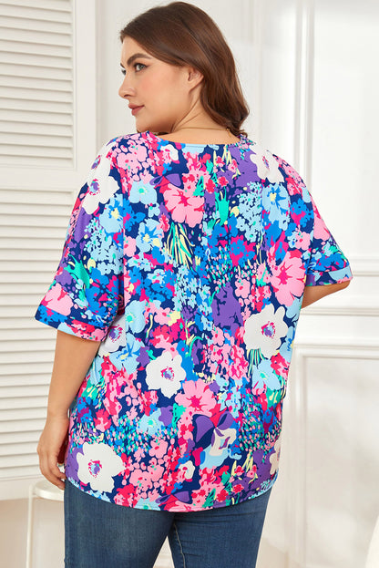 Blusa floral con cuello en V y costura central