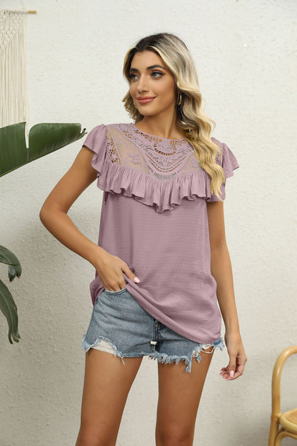 Blusa con volantes y encaje empalmado