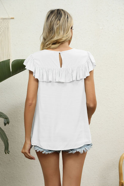 Blusa con volantes y encaje empalmado