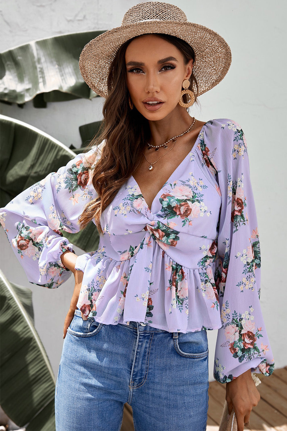 Blusa peplum retorcida floral