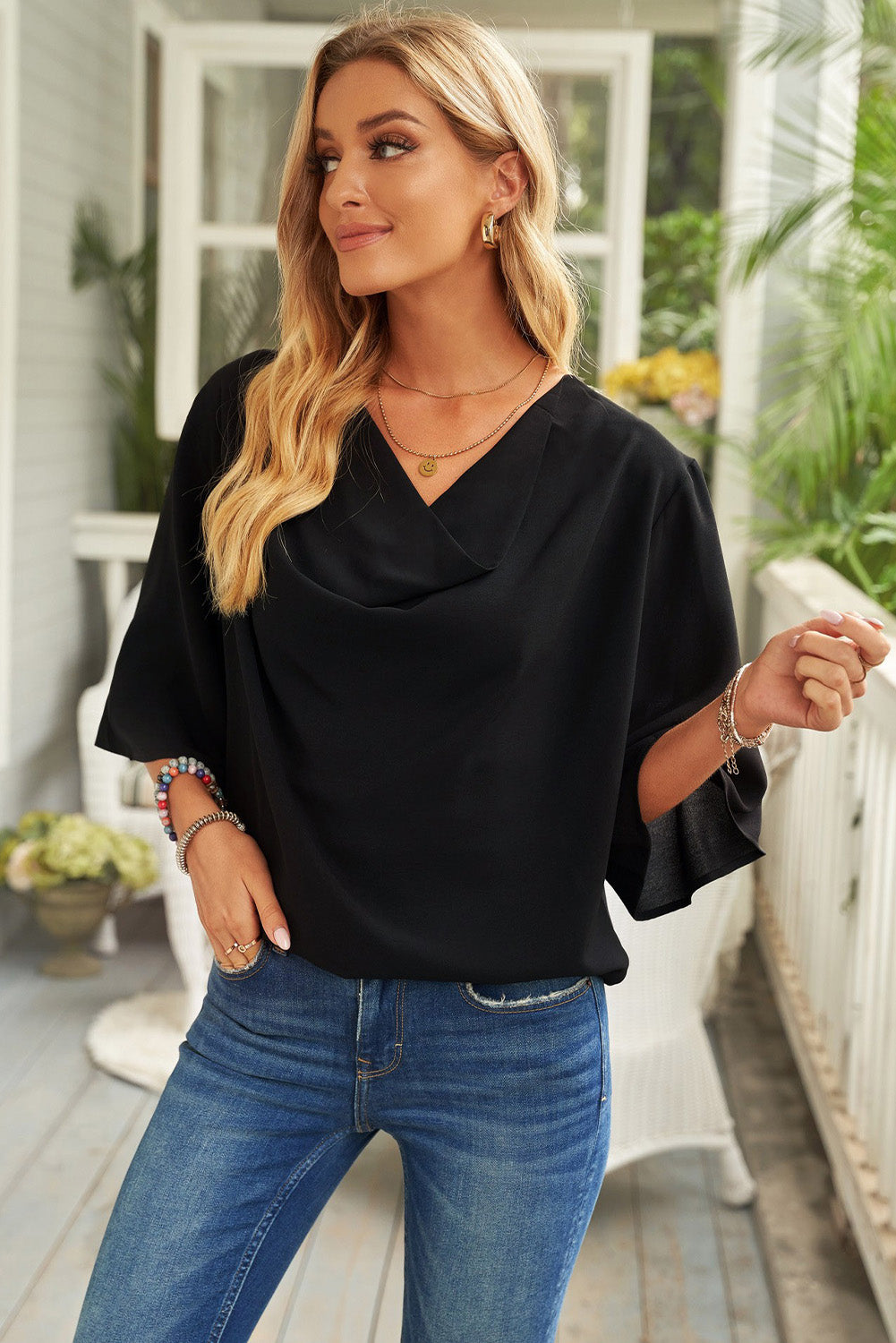 Blusa de manga tres cuartos con cuello vuelto