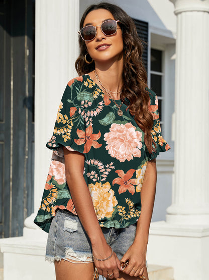 Blusa floral con mangas con volantes y volantes