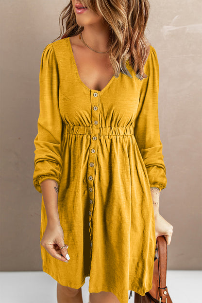 Robe jaune boutonnée à manches longues et taille haute