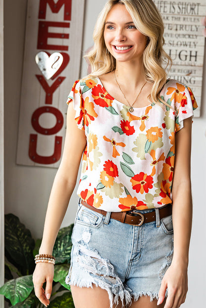 Blusa floral con cuello redondo y mangas acampanadas