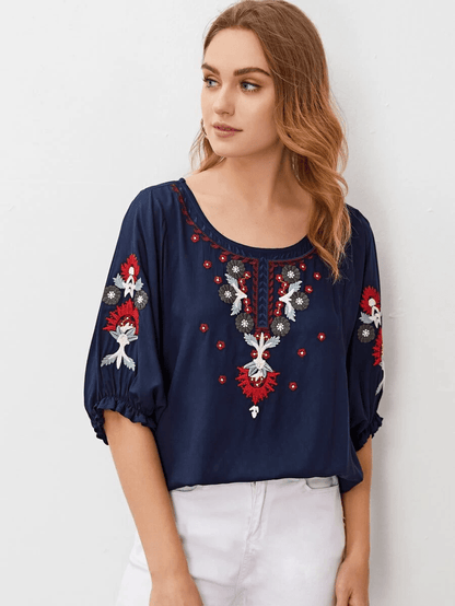 Blouse brodée à col rond et manches volantées