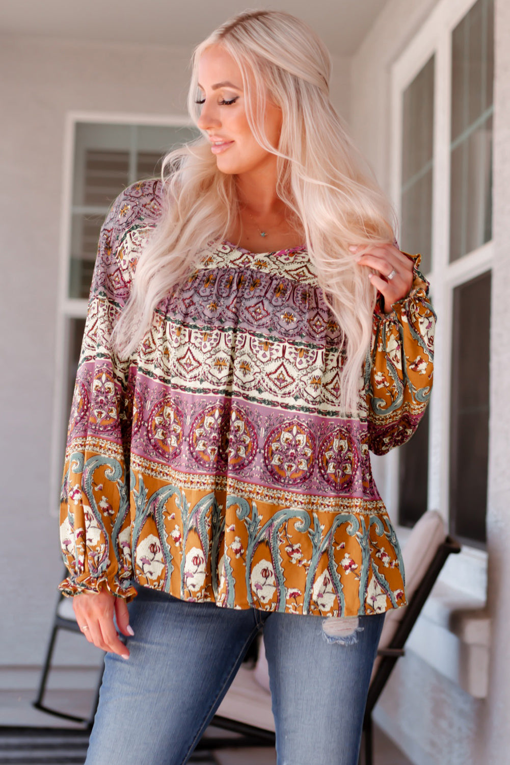 Blusa bohemia con cuello en V y manga larga con volantes