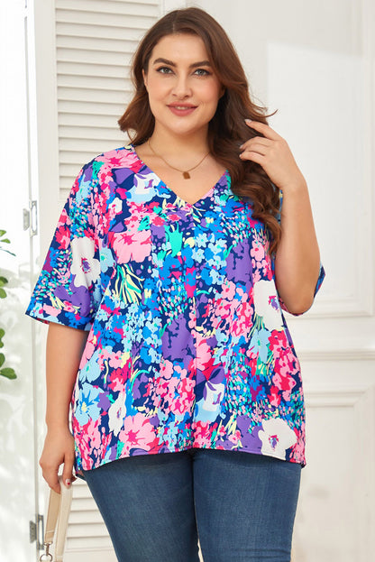 Blusa floral con cuello en V y costura central