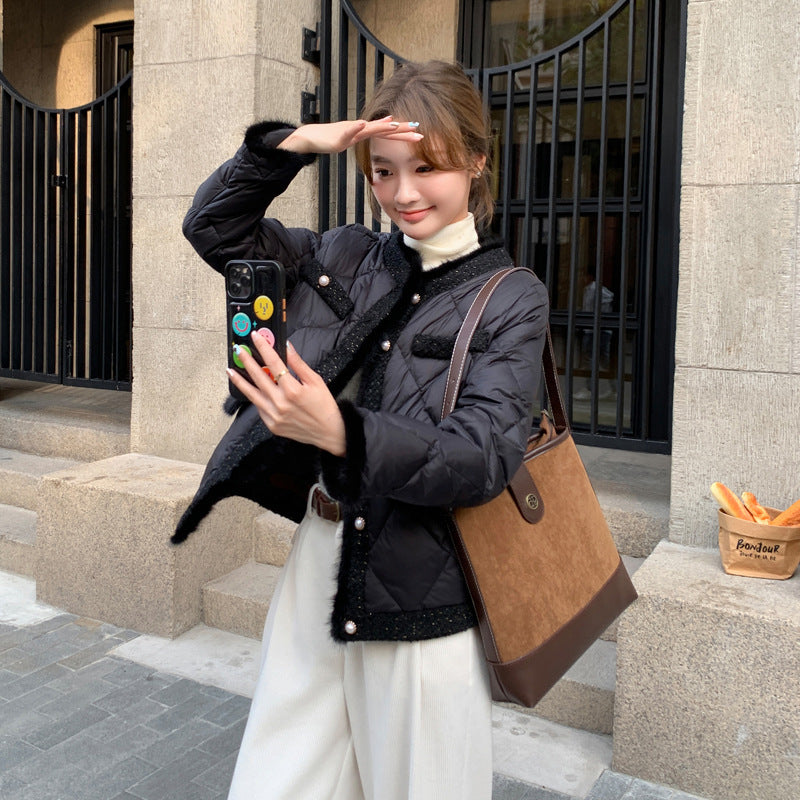 Chaqueta de plumón de visón acolchada corta de alta calidad de estilo clásico para mujer