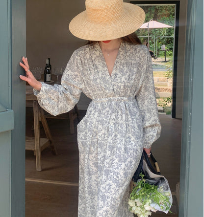 Vestido floral de manga larga por debajo de la rodilla