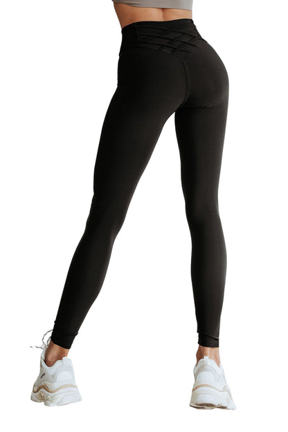 Leggings negros de cintura alta con control de barriga cruzados