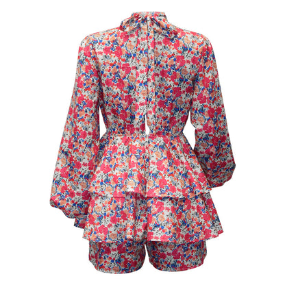 Robe décontractée florale à manches longues et à volants et dos ouvert