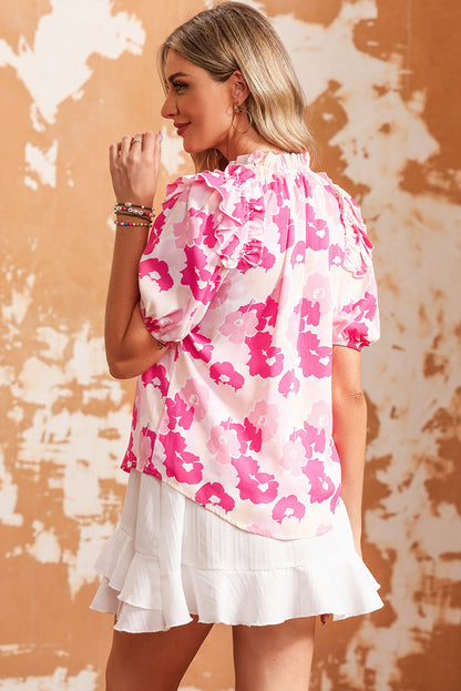 Blusa floral con hombros descubiertos y volantes