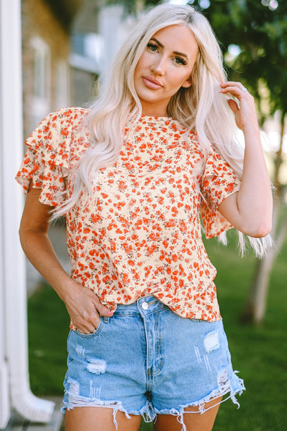 Blusa floral con cuello redondo y manga acampanada