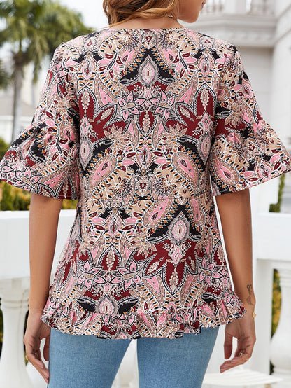 Blusa estampada con dobladillo con volantes y mangas con volantes