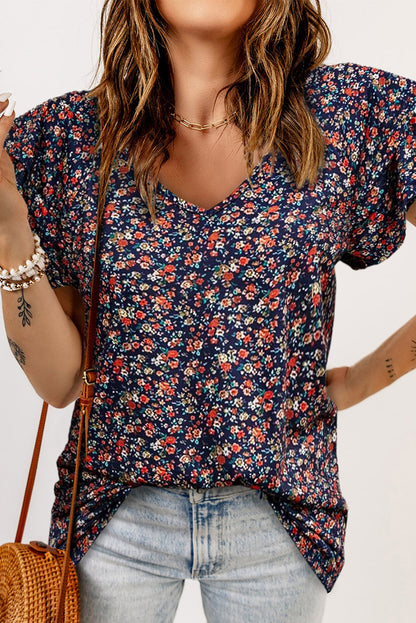 Blusa floral con cuello en V y mangas acampanadas