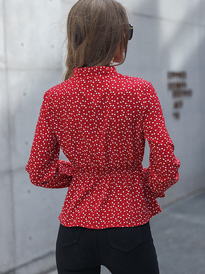 Blusa peplum con mangas con volantes estampada