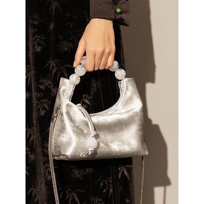 Bolso bandolera con cadena de perlas y hombro Niche