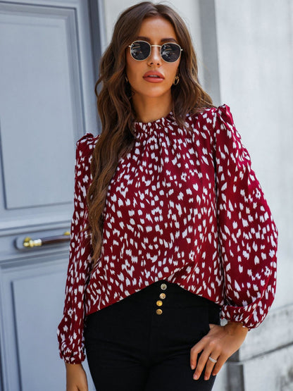 Blouse imprimée à col montant et manches bouffantes