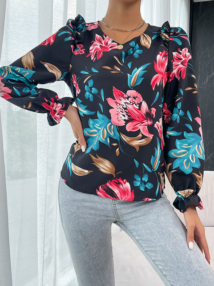 Blusa con volantes y hombros descubiertos con estampado floral