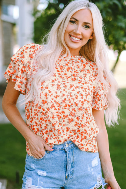 Blusa floral con cuello redondo y manga acampanada