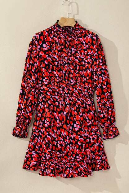 Mini-robe rouge à manches longues et imprimé en forme de coeur pour la Saint-Valentin