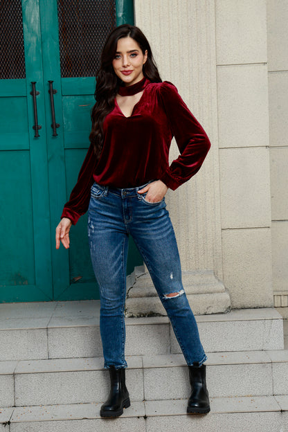 Blouse en velours à manches bouffantes et découpes